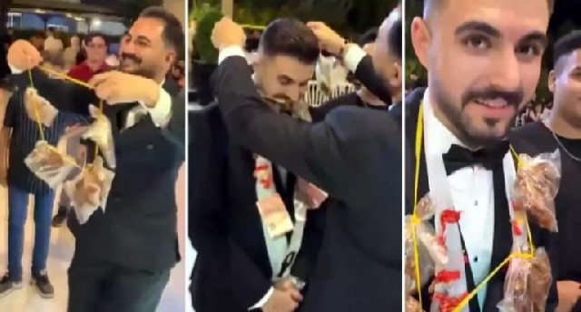 Bəyin boynuna qızıl yerinə ət taxdı - FOTO